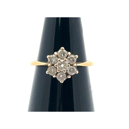 32 - A diamond 'flower' ring in yellow gold mount, stamped 18ct. Size approx M with sizing beads. Estimat... 