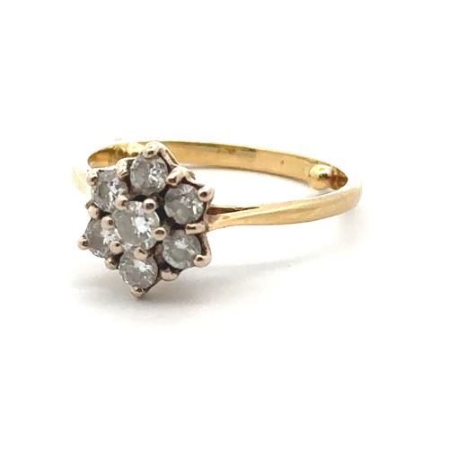 32 - A diamond 'flower' ring in yellow gold mount, stamped 18ct. Size approx M with sizing beads. Estimat... 