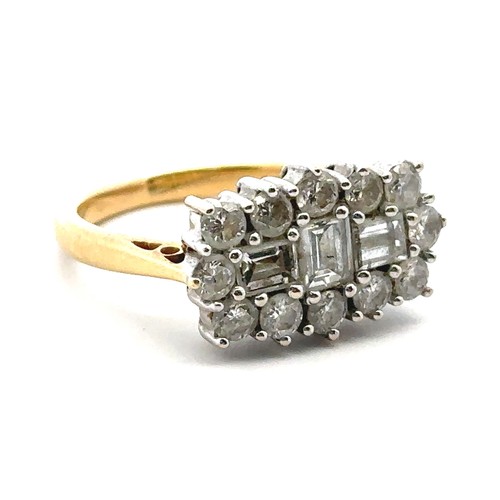 34 - An 18ct and diamond cluster ring - set with three baguette cut diamonds surrounded by 12 round brill... 