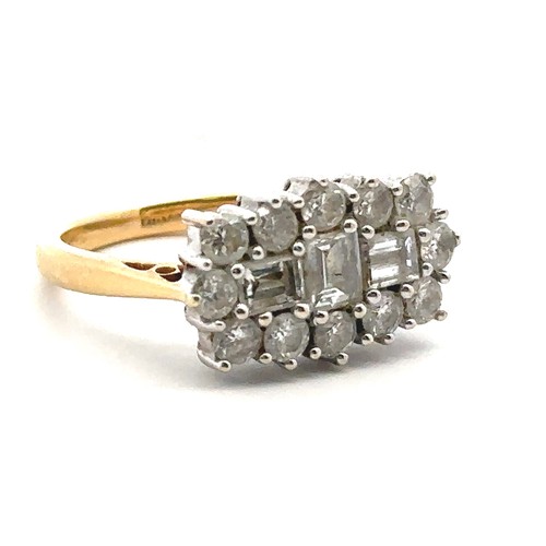 34 - An 18ct and diamond cluster ring - set with three baguette cut diamonds surrounded by 12 round brill... 