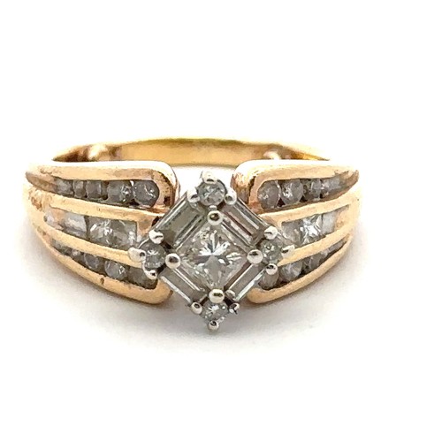 56 - Diamond cluster ring with central princess cut diamond of approx 0.2ct surrounded by 4 baguette and ... 