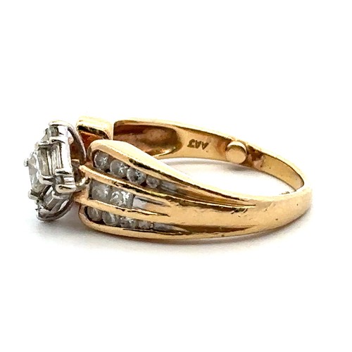 56 - Diamond cluster ring with central princess cut diamond of approx 0.2ct surrounded by 4 baguette and ... 