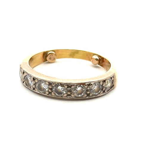 42 - Seven stone diamond half-eternity ring, estimated diamond weight approx 0.7ct. Size O with sizing be... 