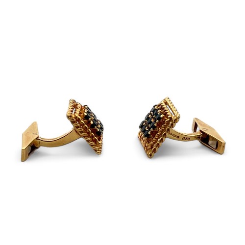 17 - A pair of 18ct yellow gold cufflinks with rope twist designed mount and set with nine round sapphire... 