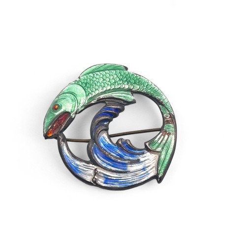 45 - A Darby & Son silver and enamel brooch, modelled as a leaping fish amongst waves, enamelled in blue ... 