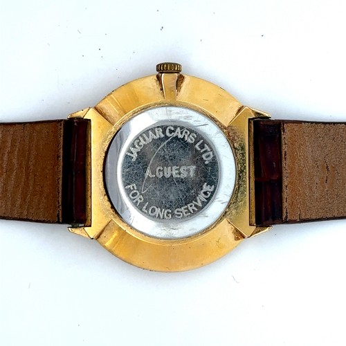 110 - A Garrard gold plated watch inscribed on back of case 'A Guest Jaguar Cars ltd For Long Service.' In... 