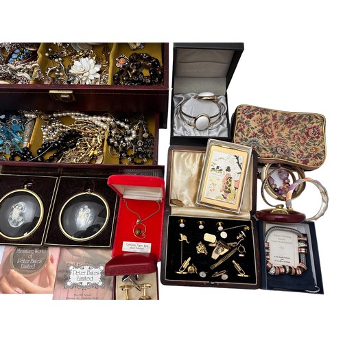 90 - A wooden jewellery box together with a large amount of costume jewellery.