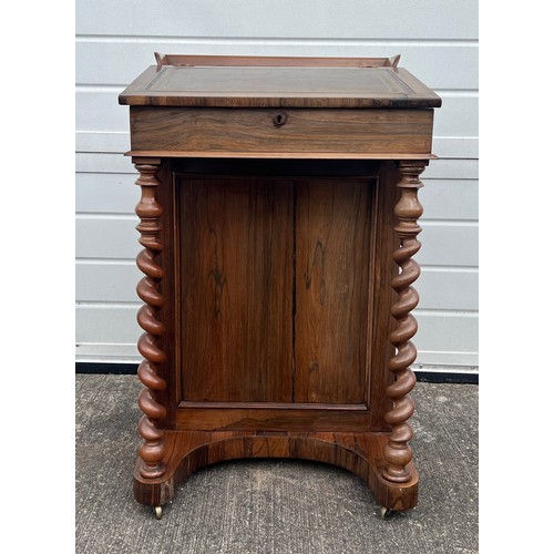 474 - A William IV rosewood Davenport, circa 1830, 4 drawers to right hand side with dummy drawers to left... 