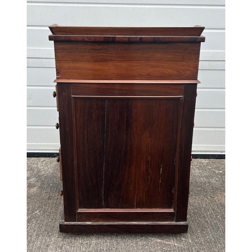 474 - A William IV rosewood Davenport, circa 1830, 4 drawers to right hand side with dummy drawers to left... 