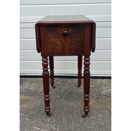 475 - A mahogany drop-leaf side table. H70, top 53 x 36 extending to 71cm.