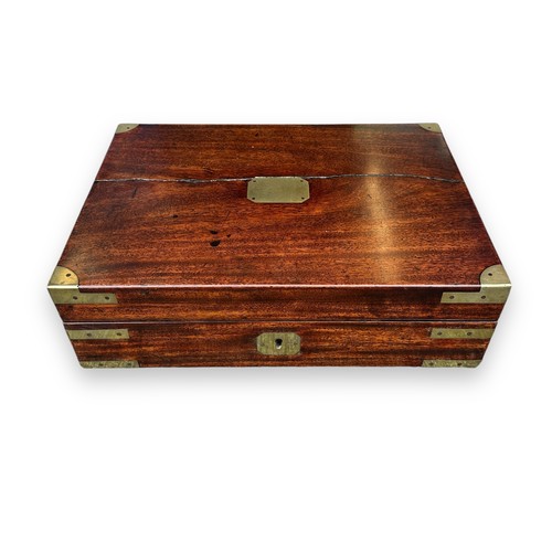 477 - A brass-bound Victorian writing box with original brass bounds and key. Some need refitting to side ... 