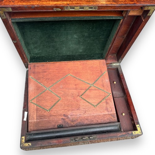 477 - A brass-bound Victorian writing box with original brass bounds and key. Some need refitting to side ... 