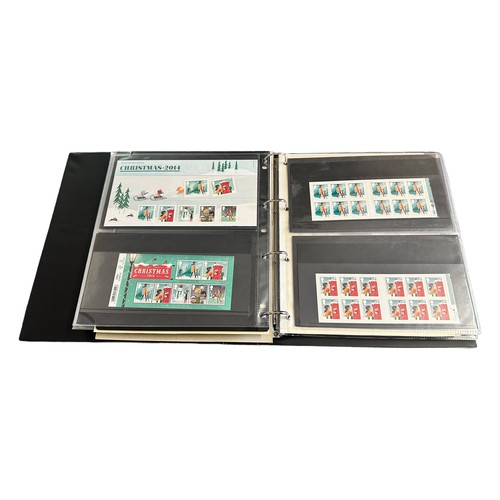 128 - GB Decimal. UM Christmas coln in binder to 2019 with sets and M/S’s, 1st and 2nd class bklts of 12. ... 