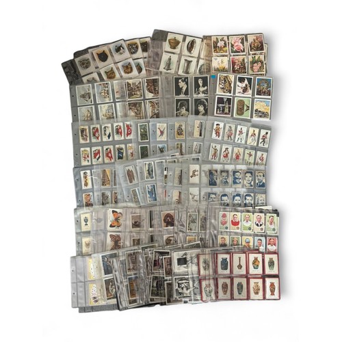 299 - Collection of cigarette cards, mainly complete sets in plastic sleeves, condition is good to excelle... 