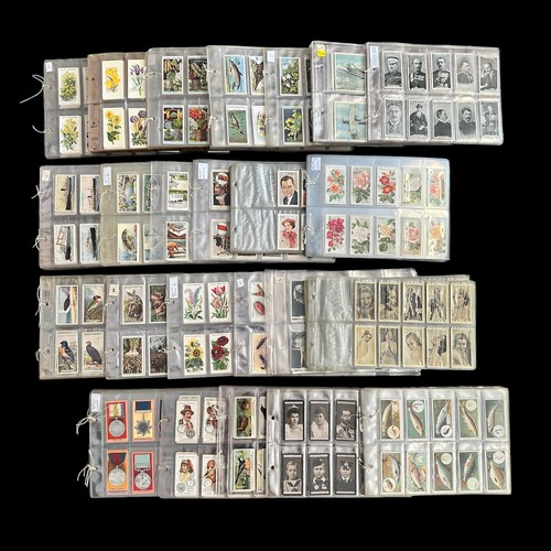 308 - Collection of cigarette cards, mainly complete sets in plastic sleeves, in variable condition, but m... 