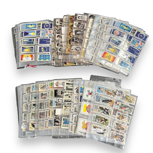 366 - Large trade card collection, complete and part sets in 6 albums and plastic sleeves, in mixed condit... 