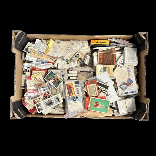 367 - Large accumulation of trade cards and cigarette cards, in 3 fruit trays, condition is mixed with som... 