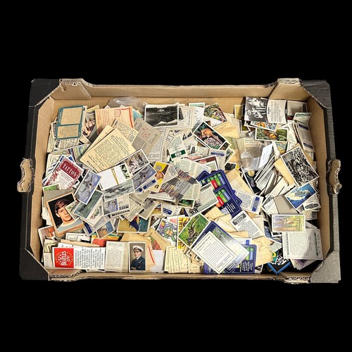 367 - Large accumulation of trade cards and cigarette cards, in 3 fruit trays, condition is mixed with som... 