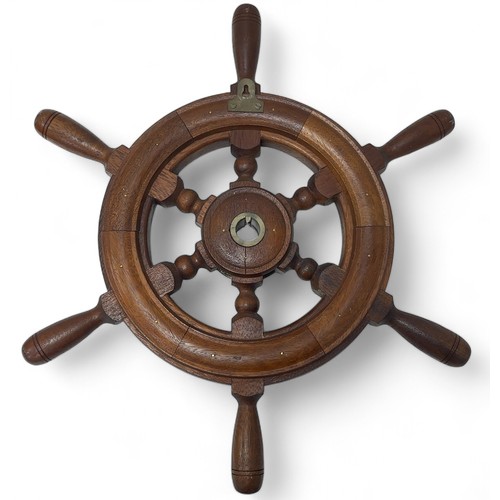 276 - An unmarked wood and brass ship's wheel. Diameter 52cm. The proceeds from this lot will go to the Br... 