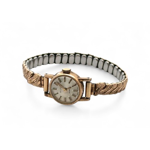 71 - 9ct gold Avia ladies watch on a rolled gold bracelet. Watch is not winding or ticking. Weight 16.55g... 