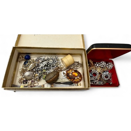 65 - A small collection of silver jewellery and costume jewellery etc. Includes a circular locket stamped... 