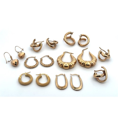 14 - Eight pairs of 9ct gold earrings , some hallmarked some stamped 9ct/ 375.