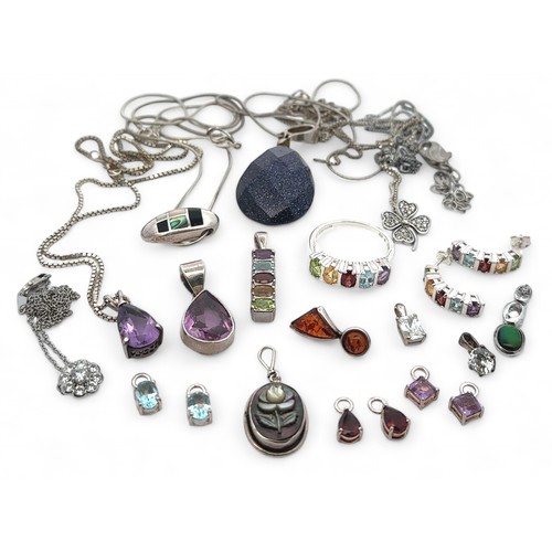 36 - A good collection of silver jewellery, including a multi-gem ring, pendant and earrings set, a blue ... 