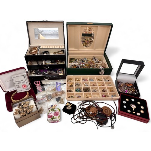 37 - Two jewellery boxes, one containing a large amount of silver and good quality costume jewellery. The... 