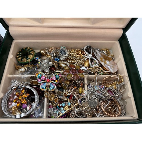 37 - Two jewellery boxes, one containing a large amount of silver and good quality costume jewellery. The... 