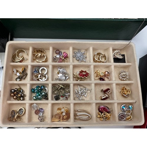 37 - Two jewellery boxes, one containing a large amount of silver and good quality costume jewellery. The... 