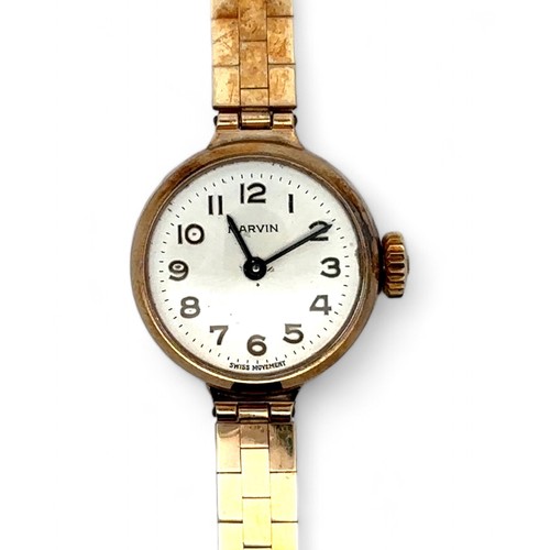 74 - A Marvin ladies 9ct gold watch on a 9ct gold bracelet. Watch is not running.