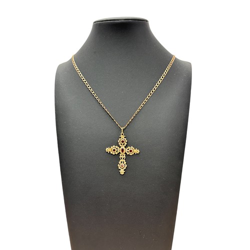 5 - An attractive 9ct gold and garnet cross pendant necklace on a hallmarked 9ct gold chain.