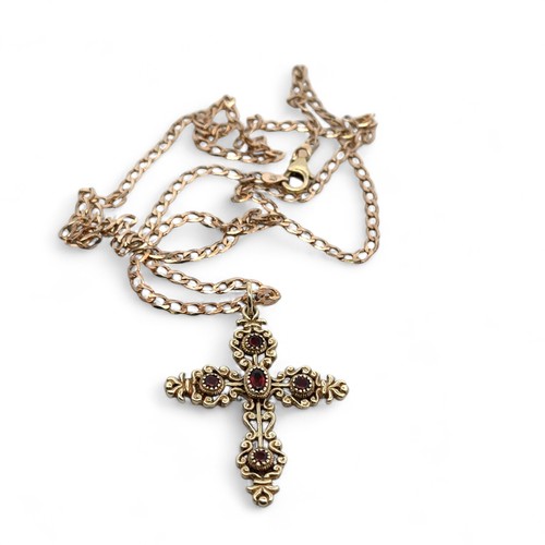 5 - An attractive 9ct gold and garnet cross pendant necklace on a hallmarked 9ct gold chain.