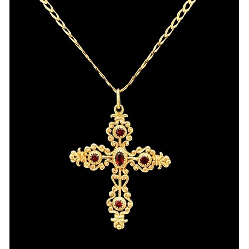 5 - An attractive 9ct gold and garnet cross pendant necklace on a hallmarked 9ct gold chain.