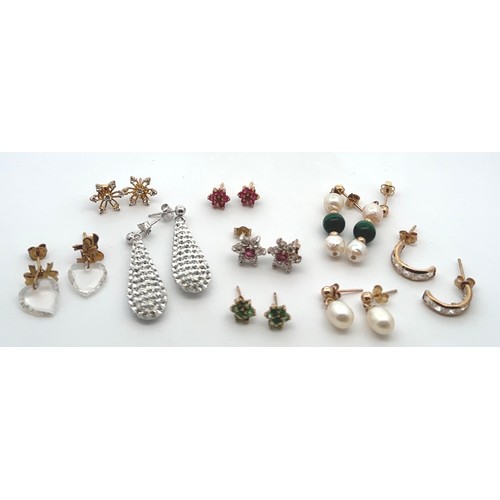 44 - Nine pairs of 9ct gold and gem set earrings, some with missing backs. Includes a pair of ruby flower... 