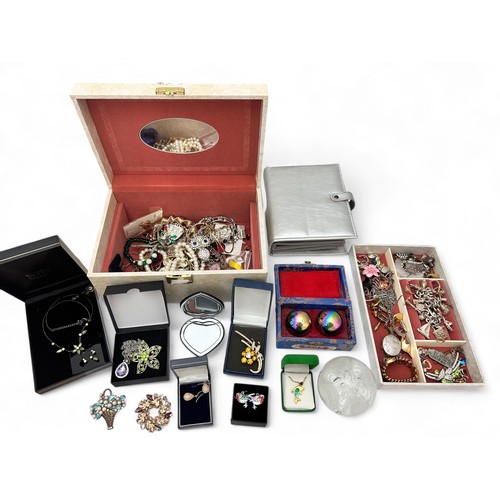 52 - A jewellery box containing silver and costume jewellery including a silver charm bracelet. Also a pa... 