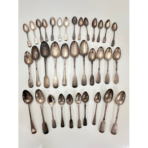 95 - A large quantity of George III/ Victorian silver spoons. George III spoons include two large serving... 