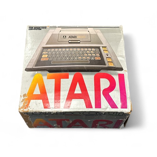 285 - The Atari 400 Home Computer, generally good plus in good to good fair boxes, with Galaxian, Pac-Man,... 