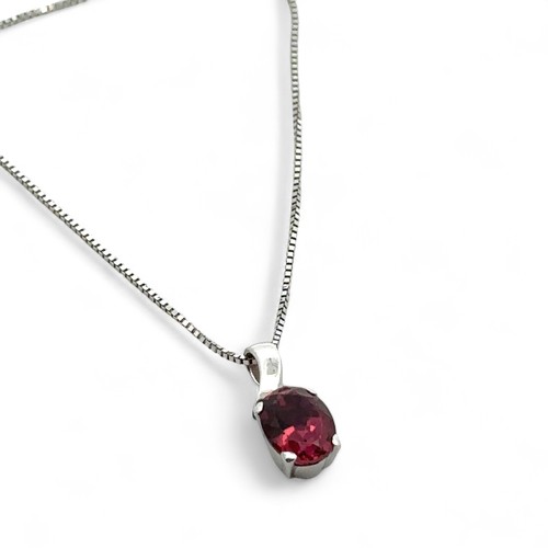 2 - A pink tourmaline pendant necklace. Tourmaline 8mm x 6mm. Pendant 13mm in length set in unmarked whi... 