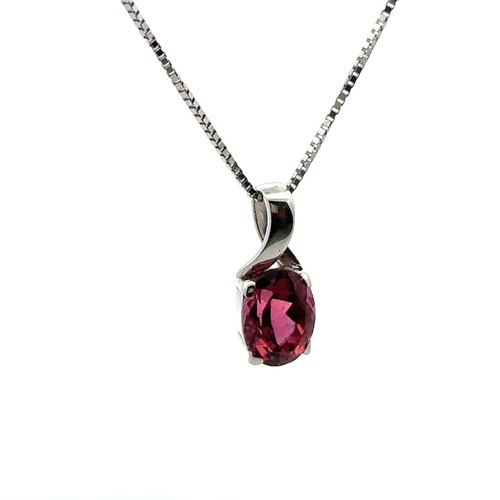 2 - A pink tourmaline pendant necklace. Tourmaline 8mm x 6mm. Pendant 13mm in length set in unmarked whi... 