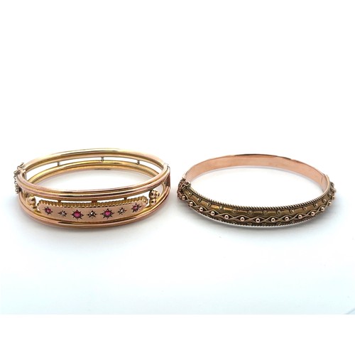 17 - Two 9ct gold bangles. A ruby and diamond set (missing one diamond) bangle stamped 9ct. Together with... 