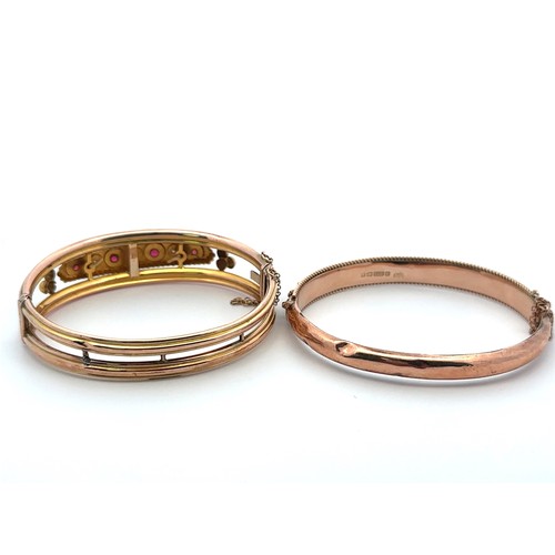 17 - Two 9ct gold bangles. A ruby and diamond set (missing one diamond) bangle stamped 9ct. Together with... 