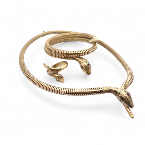 55 - A 9ct gold serpent necklace, bracelet and ring suite. The articulated necklace terminates with a tap... 