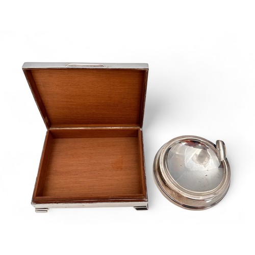 109 - A silver cigarette box with engine turned decoration and wood lined interior, approx 11.5cm x 9cm, h... 