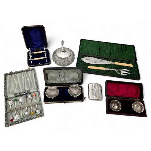 100 - A variety of silver and silver plated items. Includes two sets of salts, a silver cigarette case, a ... 