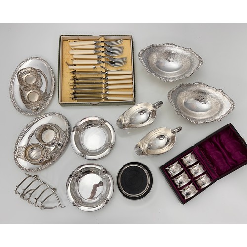 133 - A collection of good quality silver plated items. Includes a cased set of six silver plated napkin r... 