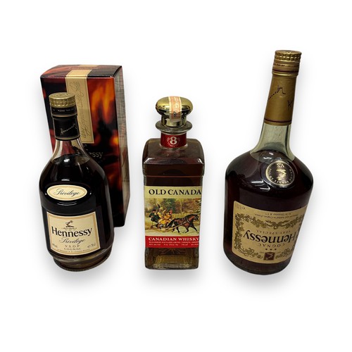 204 - Two Bottles Of Hennessy Cognac & A Bottle Of Old Canada Whisky. One 70cl bottle of Hennessy Privileg... 