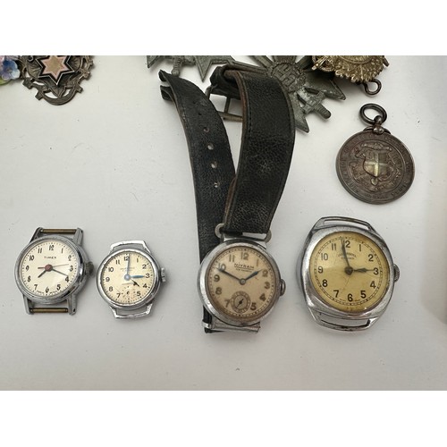 67 - Assortment of costume jewellery, Wedgwood pendant, silver medals, compacts,  a Timex watch with a Ti... 