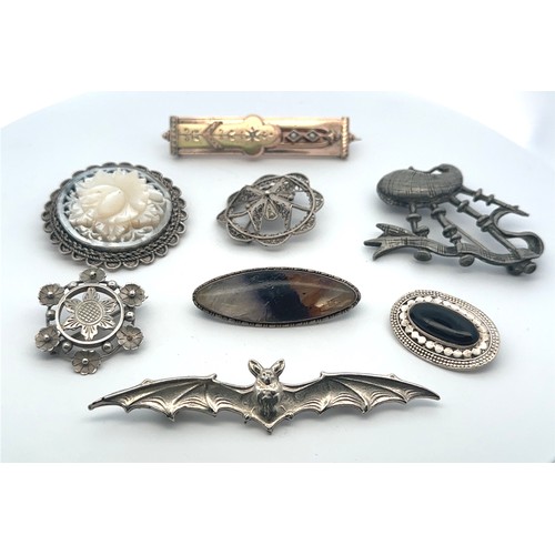 60 - Eight brooches, including a silver and Blue John brooch, a gilt and seed pearl brooch, a white metal... 