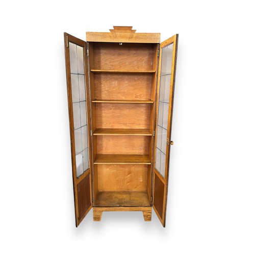 464 - A Glazed Art Deco Style Cabinet. 4 removable shelves, with latch to left side door. 180cm Height x 6... 